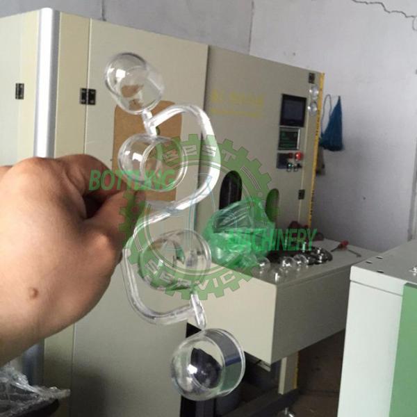 2000BPH Hand Input Feeding Open Mouth Bottle 2 Cavity Blow Molding Machine