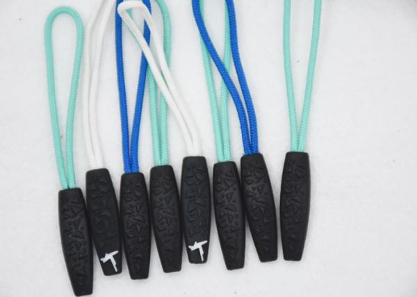 Quality Novelty SGS 3D Embossed Plastic Zipper Puller With Polyester String for sale