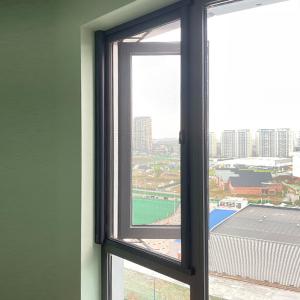 China Custom Ultra Narrow Frame Hurricane proof Impact Aluminium Frame Doors And Windows Aluminum Tilt Turn Casement Window wholesale