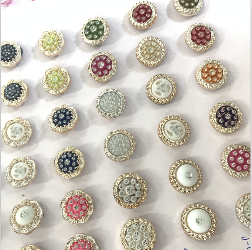 wholesale large quantity plastic shirt coat button shine stone button for garment