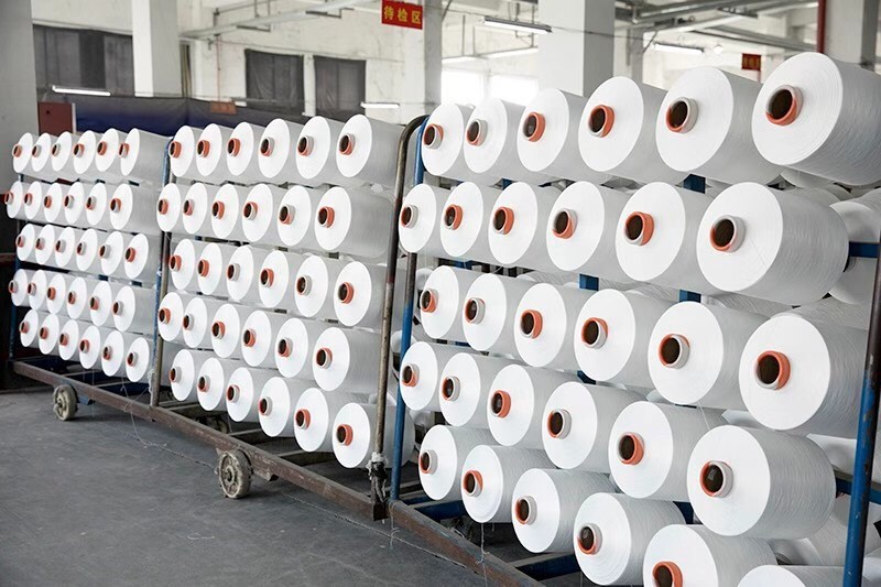 150D/48F DTY Polyester Yarn NIM SIM HIM SD100% Polyester Draw Texturing Yarn