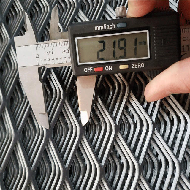 A micrometer is used to test the SWD of expanded metal mesh