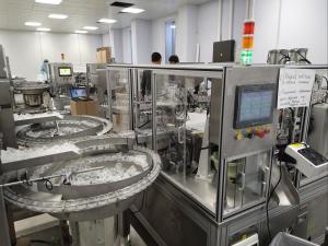 China European cap bifold cap automated assembly machine turntable type, stable, efficient wholesale