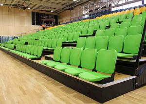 China Gymnasium Retractable Stadium Seating Anti - Slip Plywood Decking With Blow Moulded Seats wholesale