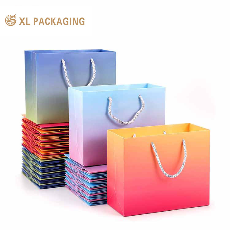 XL Packaging Custom Packaging Factory Customized Luxury Printing Paper Bag Gift Paper Packaging Paper Bag with the Custom Logo Cloth Package Shipping
