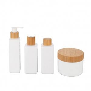China 180ml White Lotion Cosmetic Bamboo Bottle With Bamboo Cap wholesale