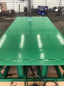 China Green Electric Telescopic Dock Leveler Built In Warehouses Loading Bay For Safest Unloading on sale