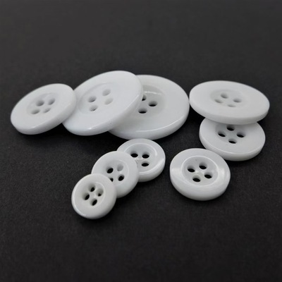 Factory wholesale resin pattern buttons four eyes mixed flower buttons coat resin bleach buttons