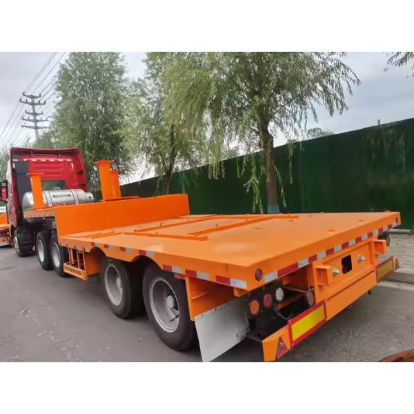 Double Axles Iron Texture Length From 10m To 20m Heavy Duty Low Flatbed Transport Truck Semi Trailer