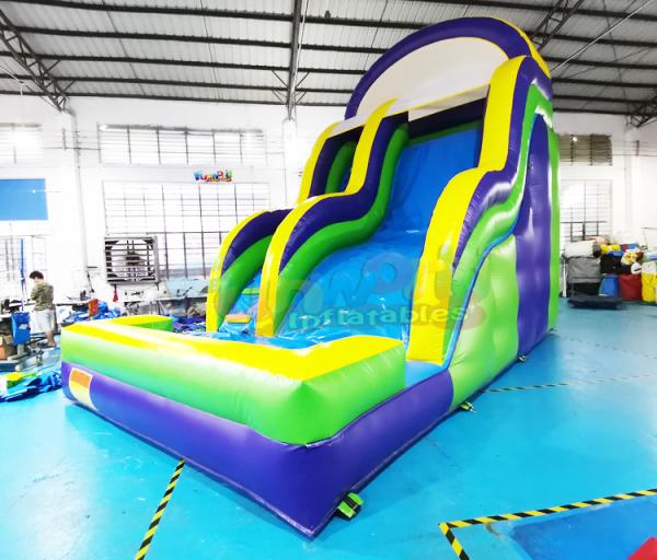 Quality Multi Color 1000D Bounce House Inflatable Water Slide With Pool for sale