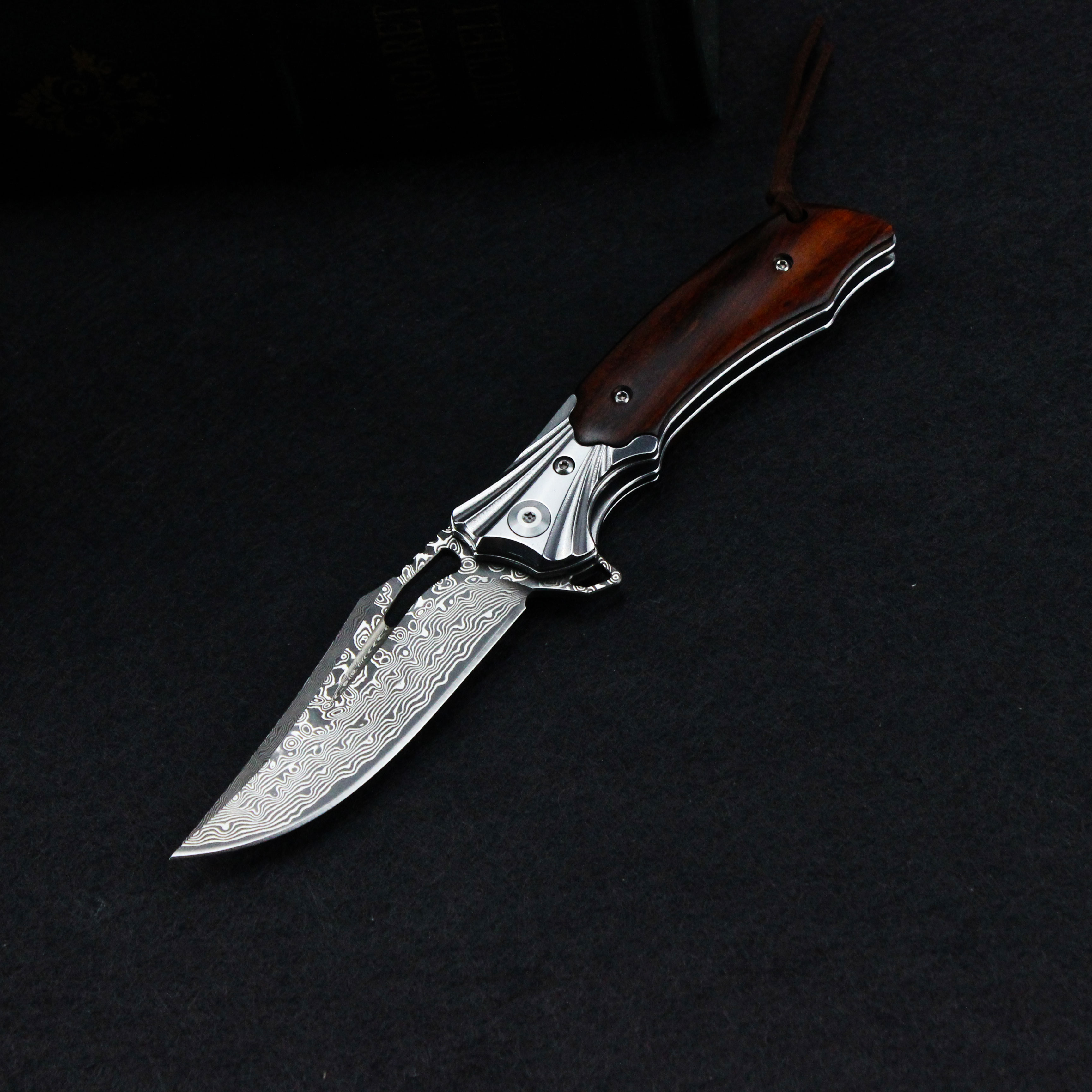 The New Damascus Folding Knife and D2 Folding Knife, with Colored Shell Handle and Desert Ironwood Handle