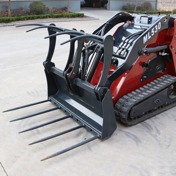 Mini skid steer loader wiht Grass grapple