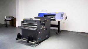 China Uv Dtf Printer Uv Transfer Ab Film A1 60cm Roll To Roll Uv Dtf Printer Sticker Label Printing Machine wholesale