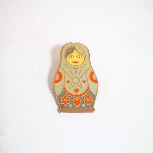 China Custom Epoxy Coated Antique Copper Lapel Pins Russian Nesting Doll With Metal Clutch wholesale