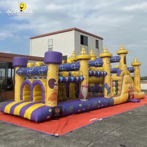 China Commercial Inflatable Obstacle Course With Slide Waterproof Yellow Purple Color wholesale