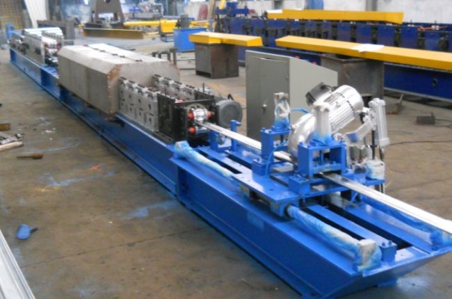Metal Galvanized Steel PU Shutter Door Roll Forming Machine / Door Frame Roll Forming Machine