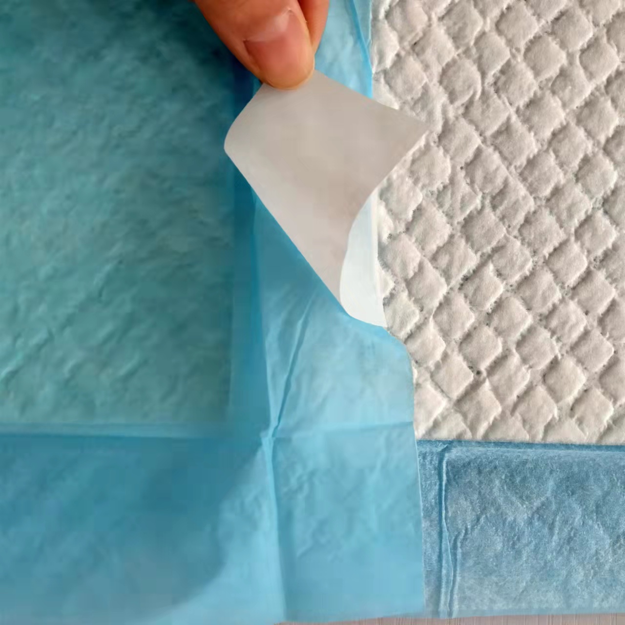 Disposable Underpad for Elderly Care Fluff Pulp SAP Non Woven Tissue PE 20g-180g
