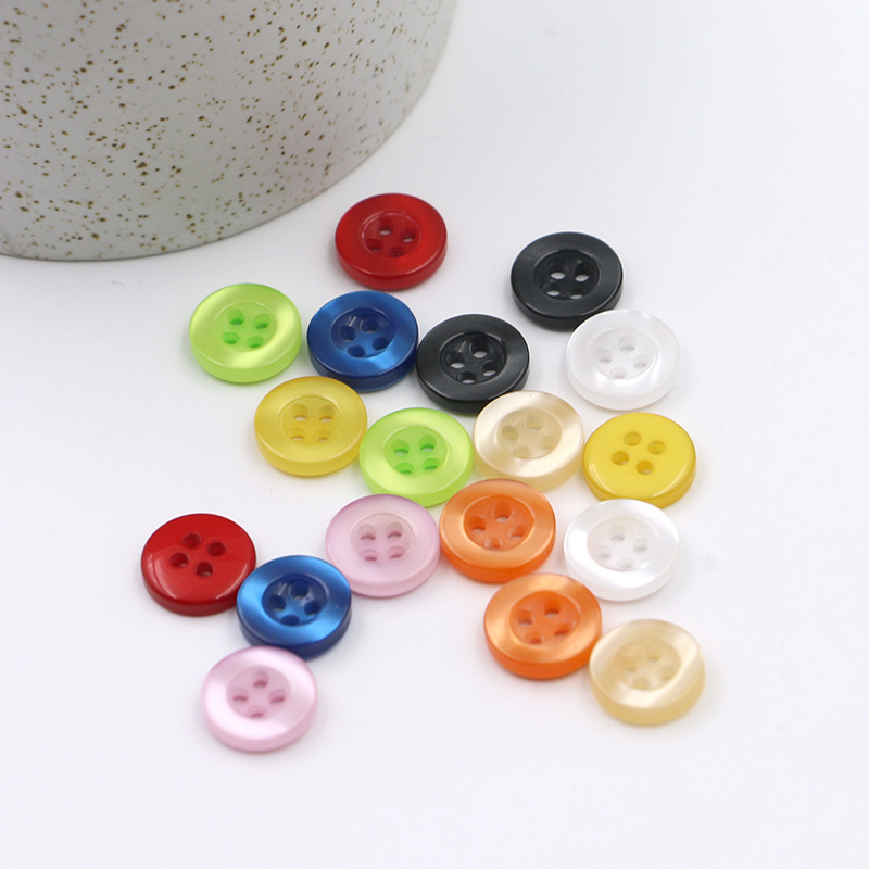 wholesale large quantity plastic shirt coat button shine stone button for garment