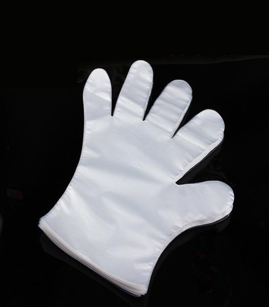 Quality Low Density Disposable Plastic Gloves For Food Handling Embossed Surface for sale
