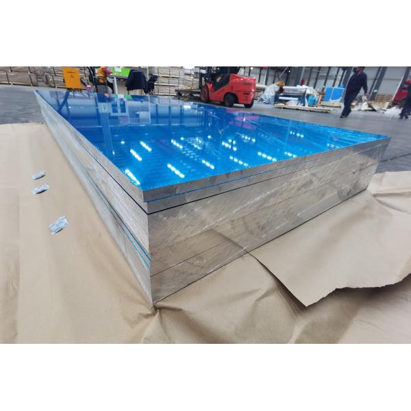 Anodized aluminium sheets stacked and organized in warehouse