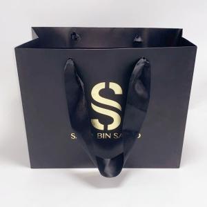 China Exquisite Black Kraft Paper Bag Silk Handle Custom Printed Paper Shopping Bags on sale