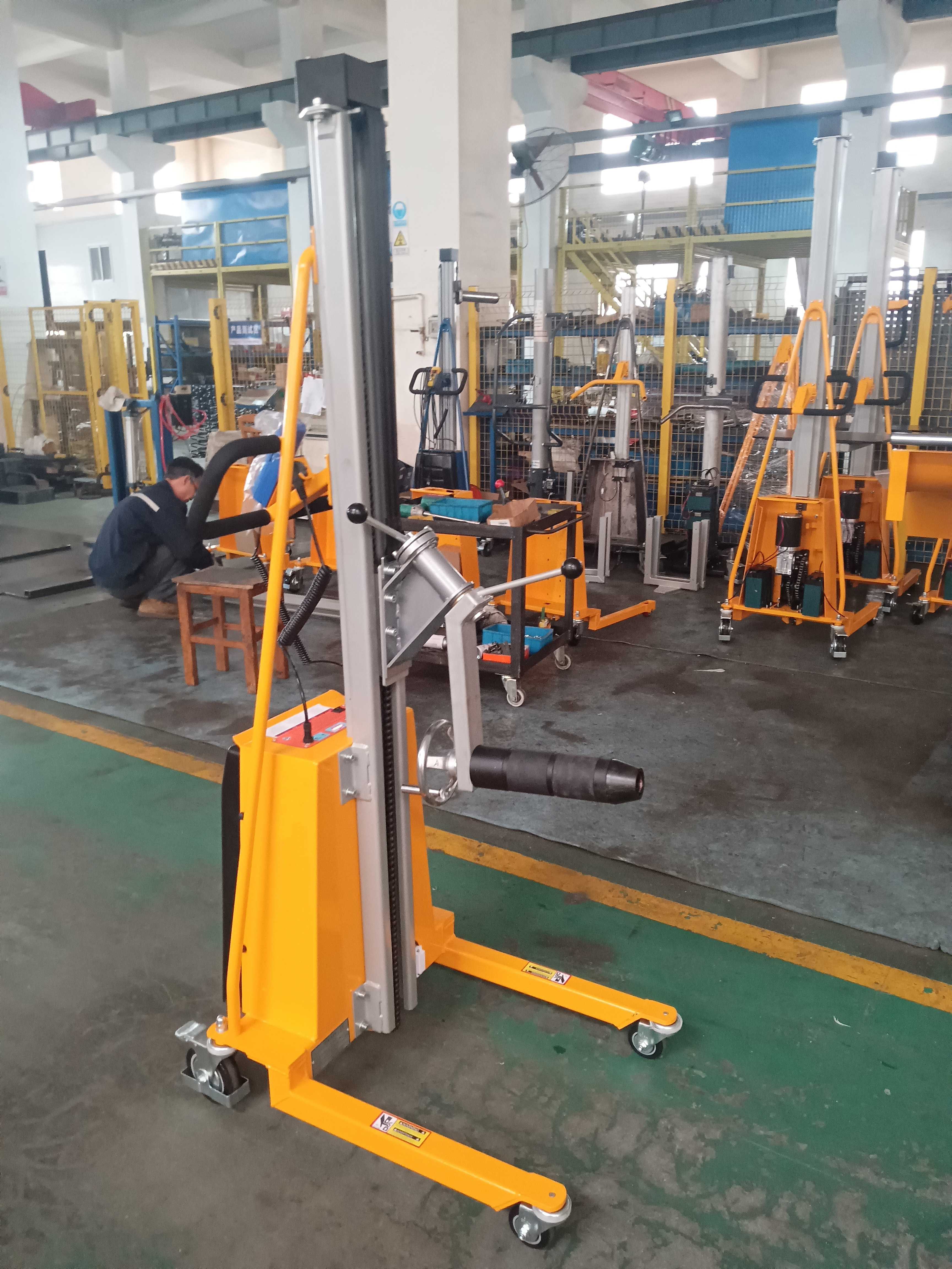Top Quality Electric Roll Rotating Lifter E100 E150 E200 E250 E300 Automatic Reel Lifting Machine 1.5 1.7 1.8 2 mt mts meters