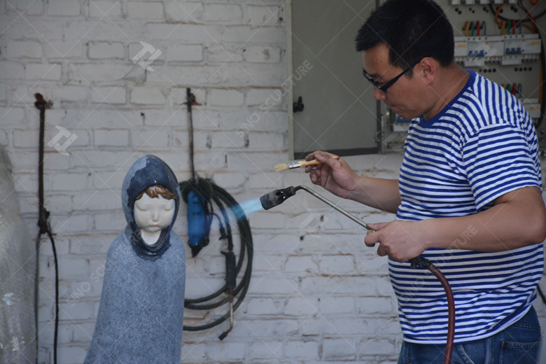 Bronze sculpture patina process