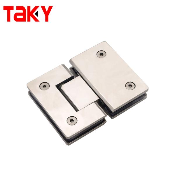 Detailed view of shower door hinge mechanism and components