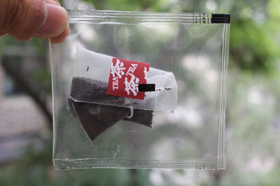 Eletctronic sclae automatic pyramid nylon tea bag packing machine with envelop