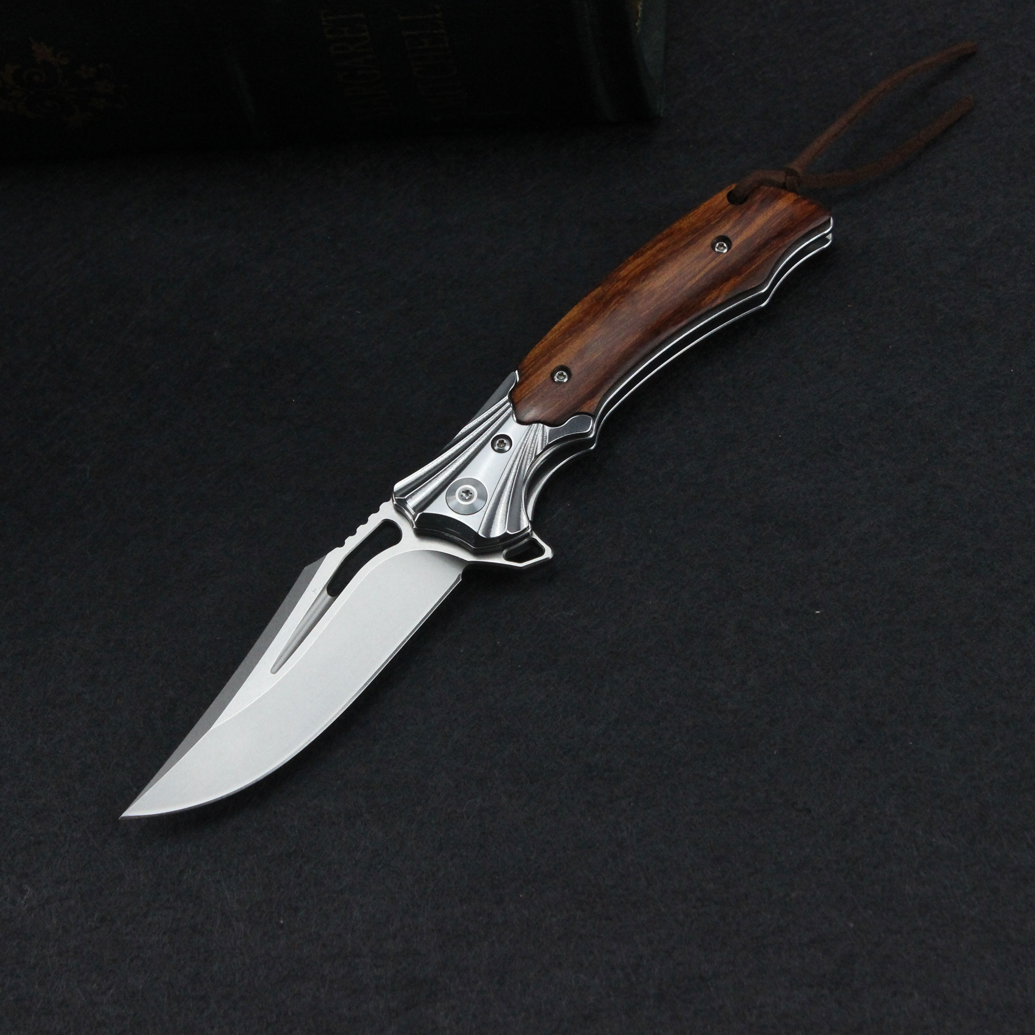 The New Damascus Folding Knife and D2 Folding Knife, with Colored Shell Handle and Desert Ironwood Handle