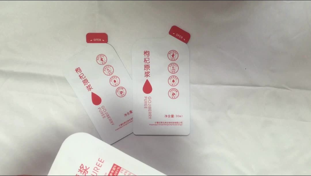 China Custom printed logo design kraft paper stand up food pouch bags for tea packaging wholesale