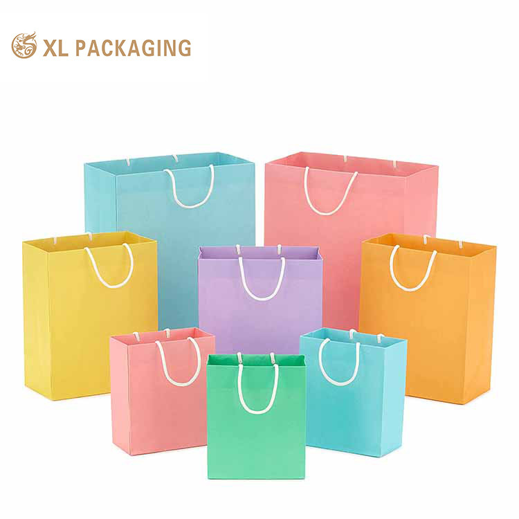 XL Packaging Custom Packaging Factory Customized Luxury Printing Paper Bag Gift Paper Packaging Paper Bag with the Custom Logo Cloth Package Shipping