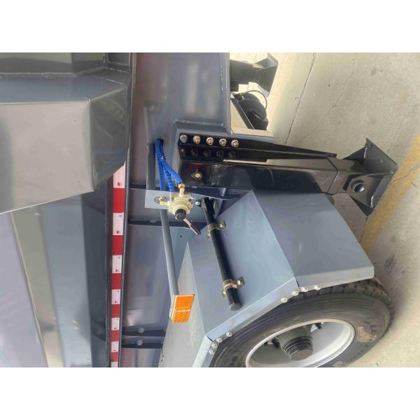 A 100 ton dump truck overturned in a Chinese factory, and a 3-axle-4-axle semi-trailer dump truck trailer is available for sale