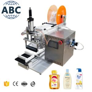 China New Style Design 50Ml Refillable Home Aromatherapy Flat Glass Bottles Manual Flat Labeling Machine wholesale