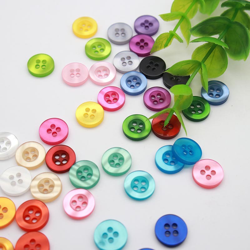 wholesale large quantity plastic shirt coat button shine stone button for garment