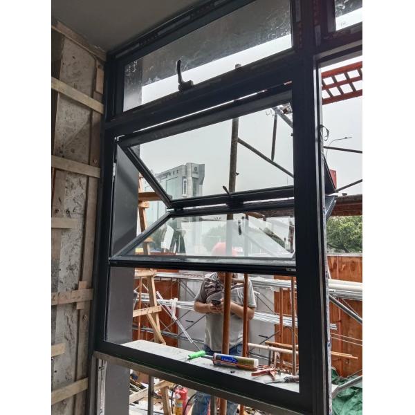 View Alpine Cabin Folding Window Framing Vertical Cliff Faces and Eagle Nesting Sites