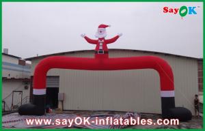 China Christmas Outdoor Big Red Inflatable Christmas Arch With Christmas Man wholesale