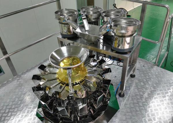 Quality Small Particles Vibration Plate Screw Counting Packaging Machine for sale
