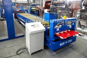 China Ethiopia 600 PLC Control System Roof Sheet Making Machine Iron Rolling Machine wholesale