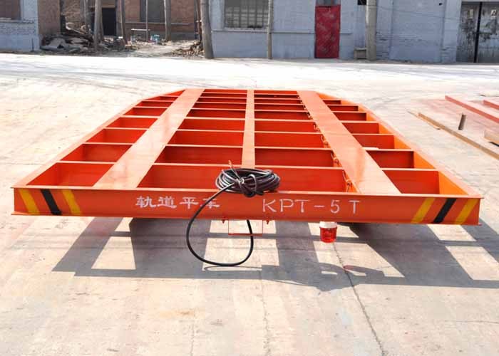steer industrial trailers on steel rails