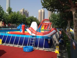 China Commercial Metal Frame Pool Red Water Slide Pool With Floating Toys on sale