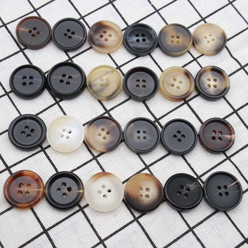 wholesale large quantity plastic shirt coat button shine stone button for garment