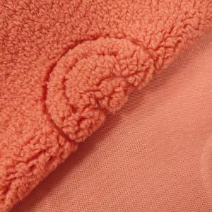China 100% Polyester Sherpa Fabric Textile Warp Knitted Smilling Face Pattern Embossed wholesale