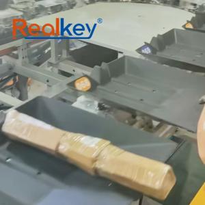 China Realkey Tilt Tray Sorter Smart Efficient Sorting For Small &amp; Irregular Packages wholesale