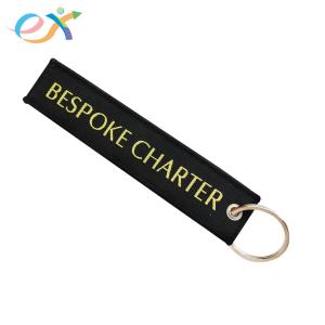 China Twill Background Fabric Woven Keychain Rectangle Shape With Merrowed Border wholesale