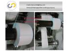 Narrow width label rotary die cutting machine with slitting roll to roll