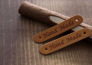 China Embossed Custom Leather Clothing Patches , Creative Leather Flight Jacket Patches wholesale