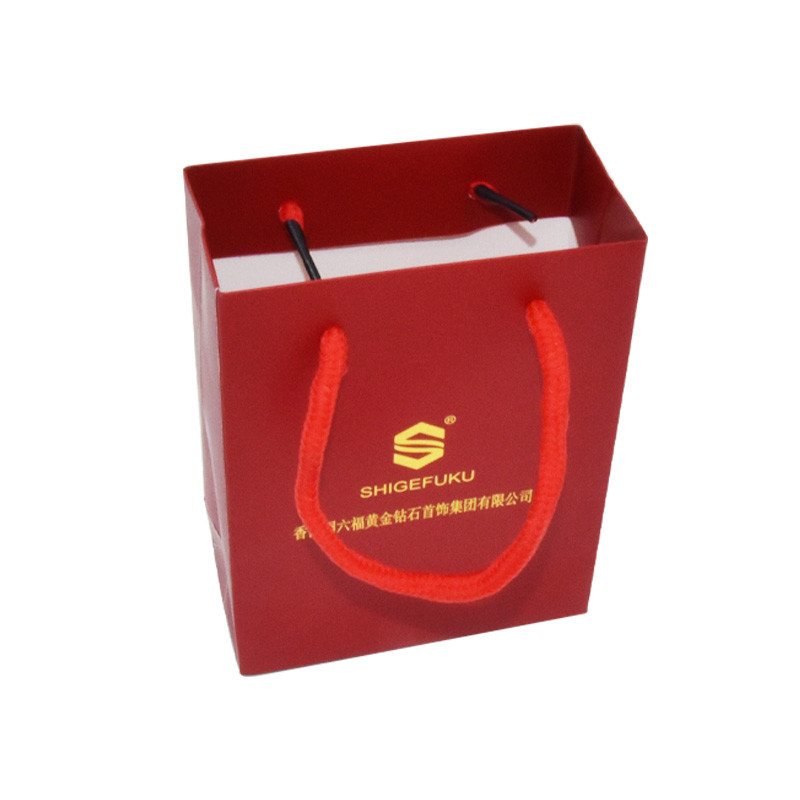 Eco Friendly Custom Paper Shopping Bags 210gsm Craft Gold Foil With Cotton Rope Handle