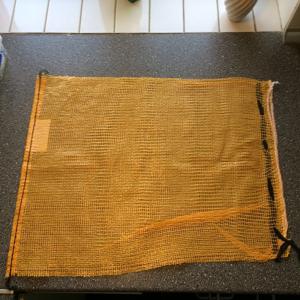 Yellow PP Woven Bag Firewood Packaging Mesh Bag with Drawstring and High Capacity