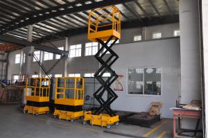 China Long Using Period Mini Mobile Scissor Lift With 200Kg Loading And Yellow Color wholesale